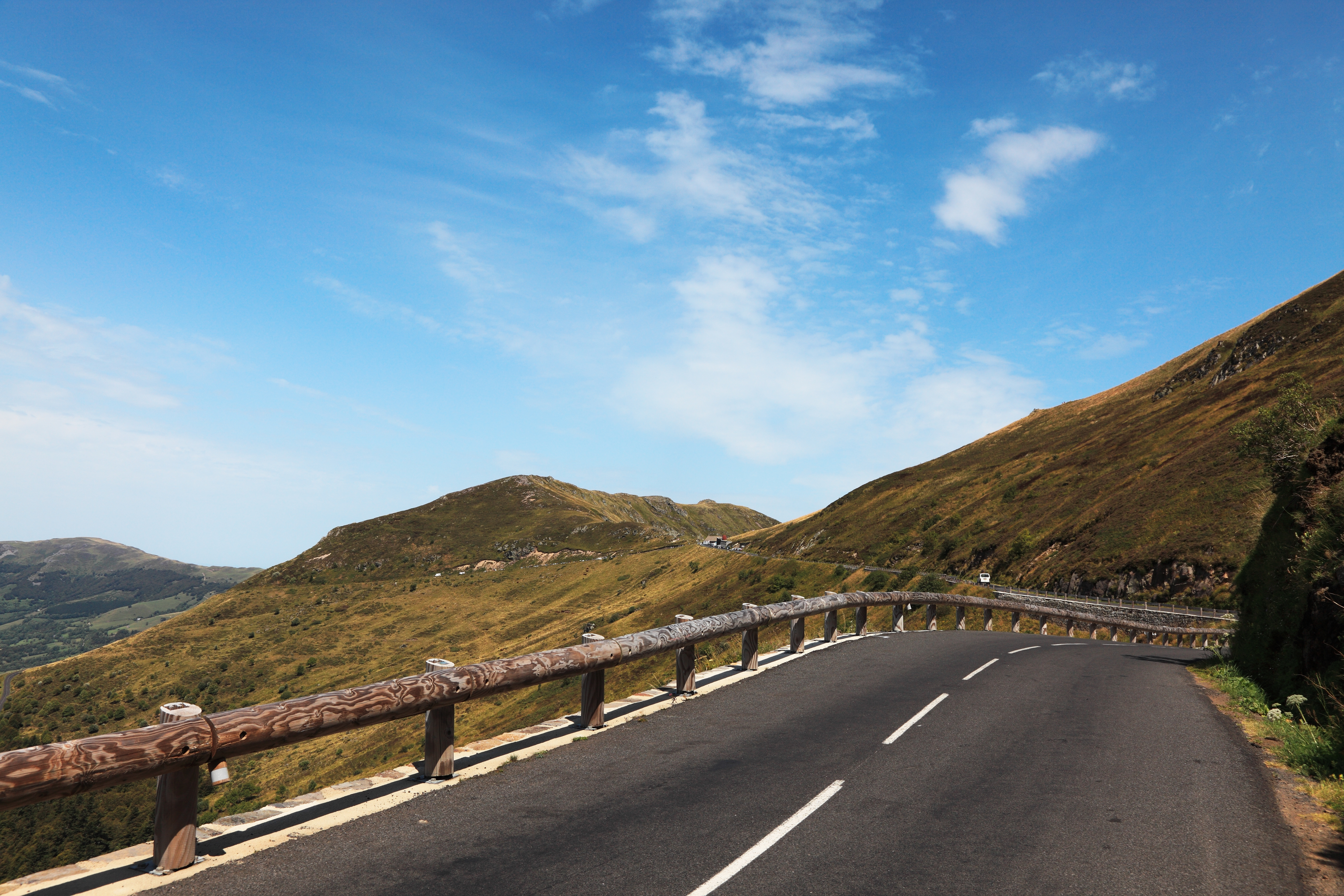Image Of A Mountain Road (to Pas De Peyrol- 1589m ) Located In The Central Massif In Auvergne Region Of France. This Is Is The Highest Road In This Massif And It Is A Traditional Route For The Tour Of France (the Biggest Cycling Race In The World).